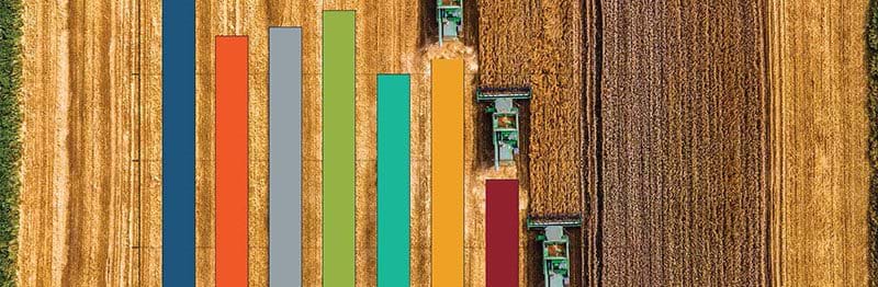 Tractors in a plowed field represents the bars of a chart